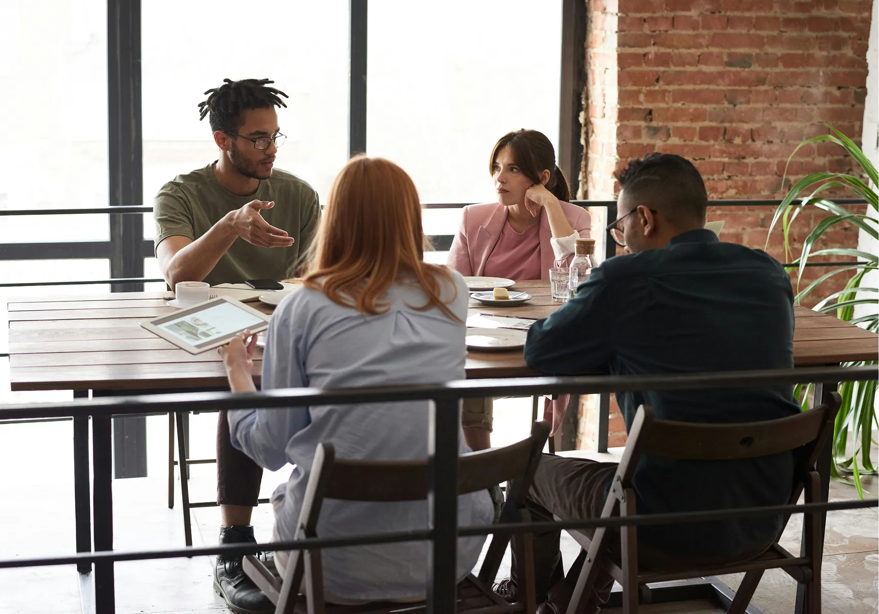 A team working together around a shared table