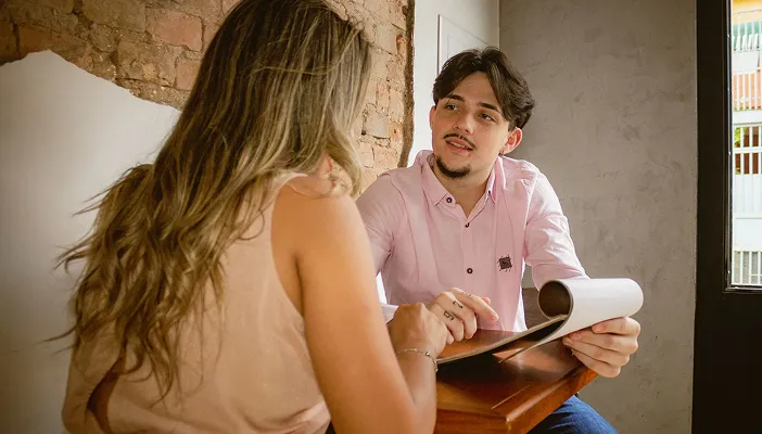 Reviewing plan paperwork together at a desk